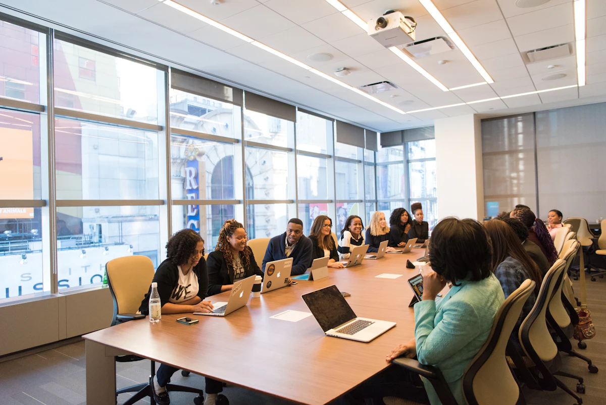 Colleagues in a meeting around a boardroom table