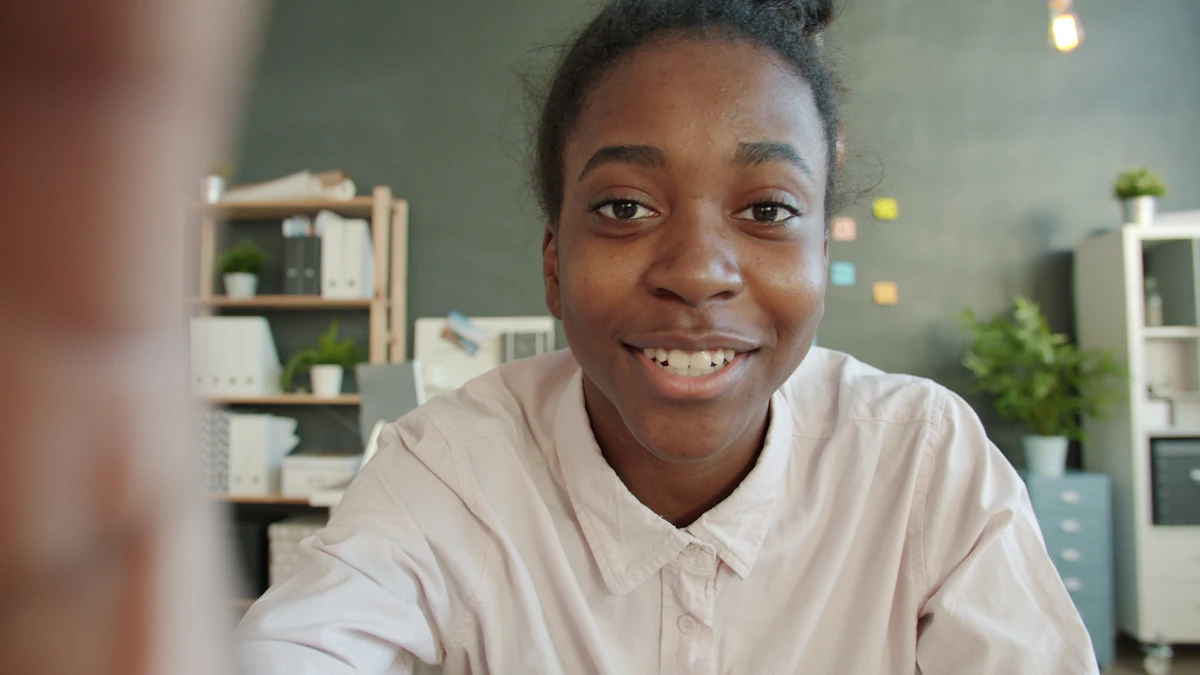 A young woman smiling during a video call